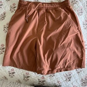 lululemon athletica Men's Athletic Shorts in Rust, linerless 5” inseam